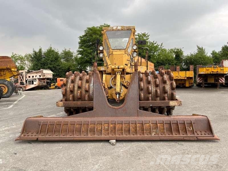 CAT 825 + porte engins Kompaktori zemlje