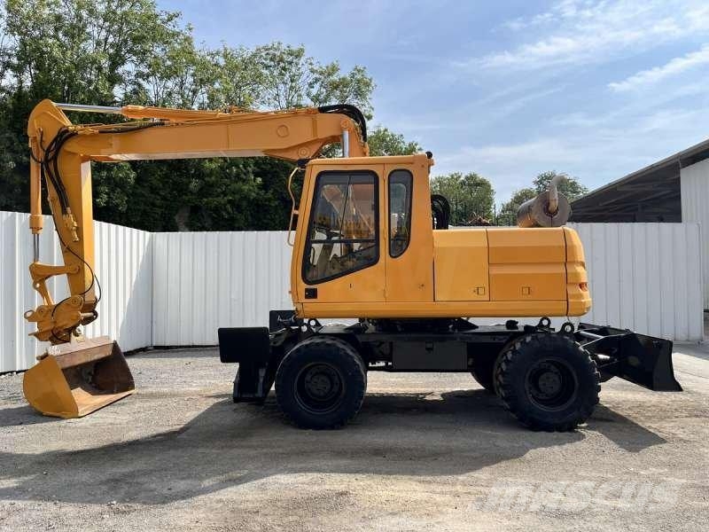 CAT M315 Bagri na kolesih