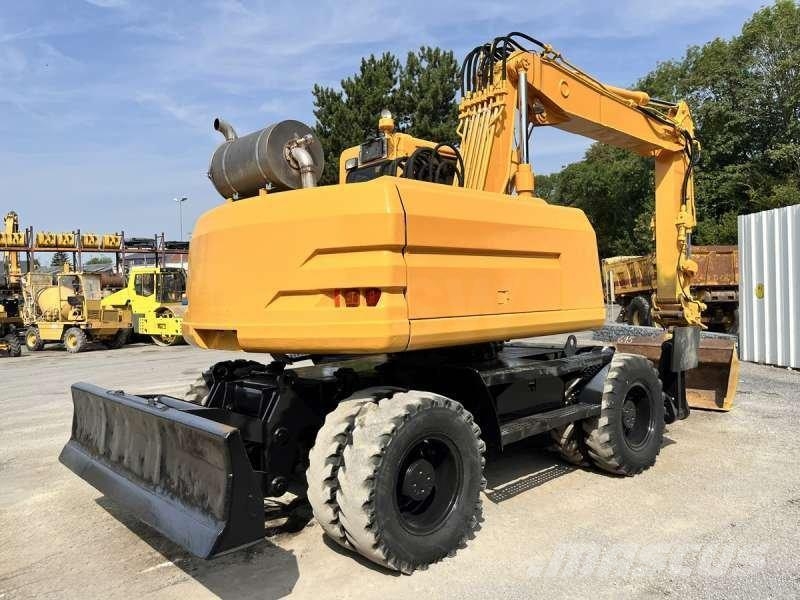 CAT M315 Bagri na kolesih