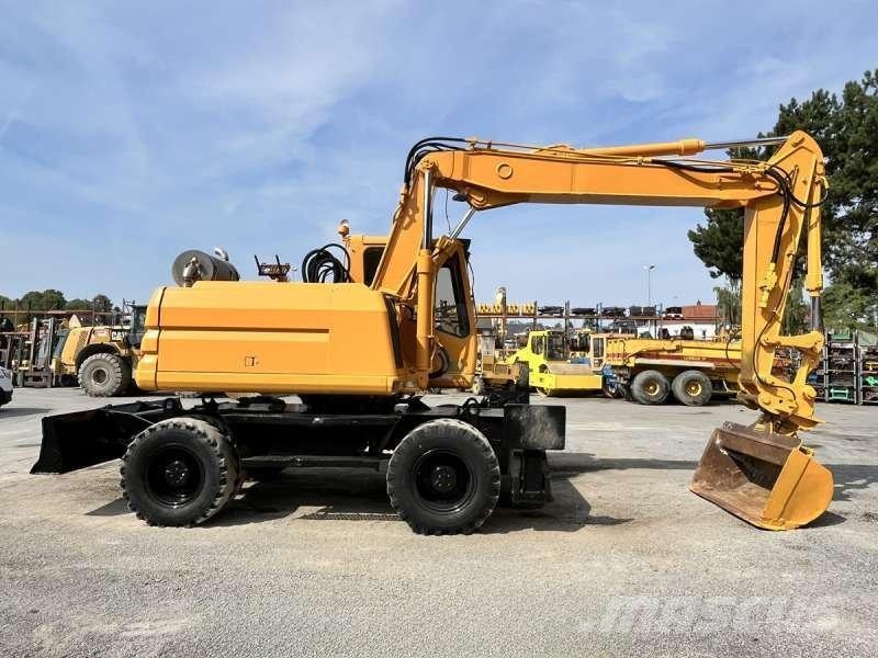 CAT M315 Bagri na kolesih