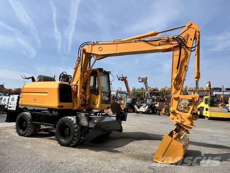 CAT M315 Bagri na kolesih