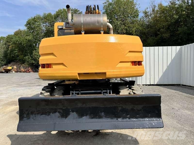 CAT M315 Bagri na kolesih
