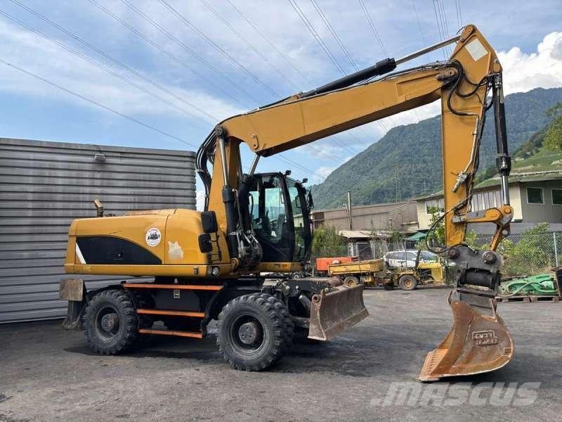 CAT M318D Bageri na kotačima