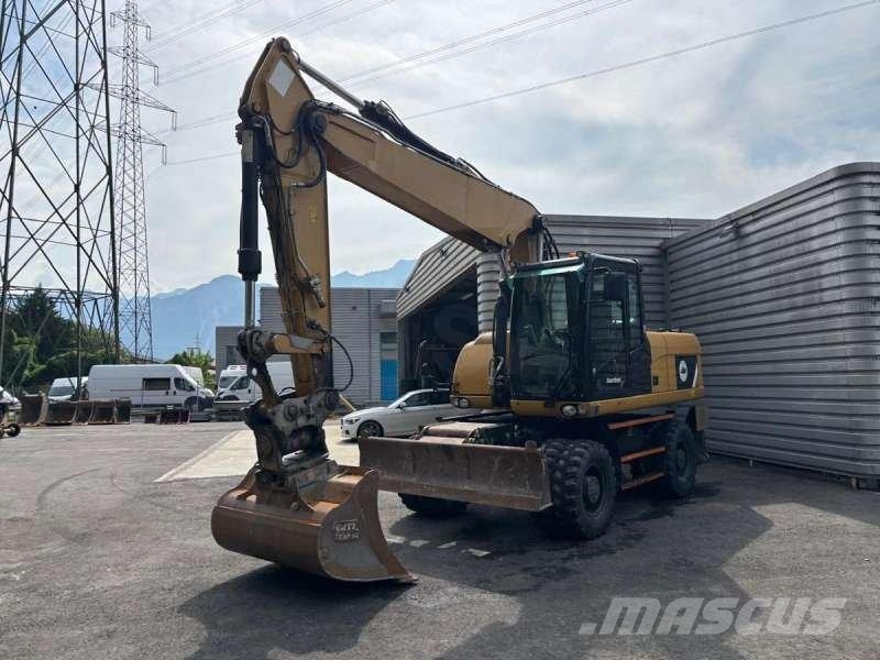 CAT M318D Bageri na kotačima