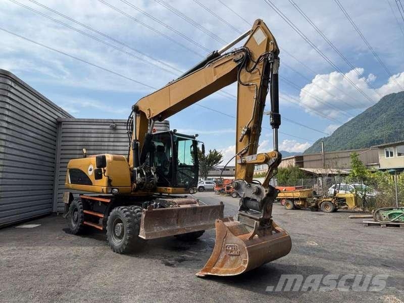 CAT M318D Bageri na kotačima