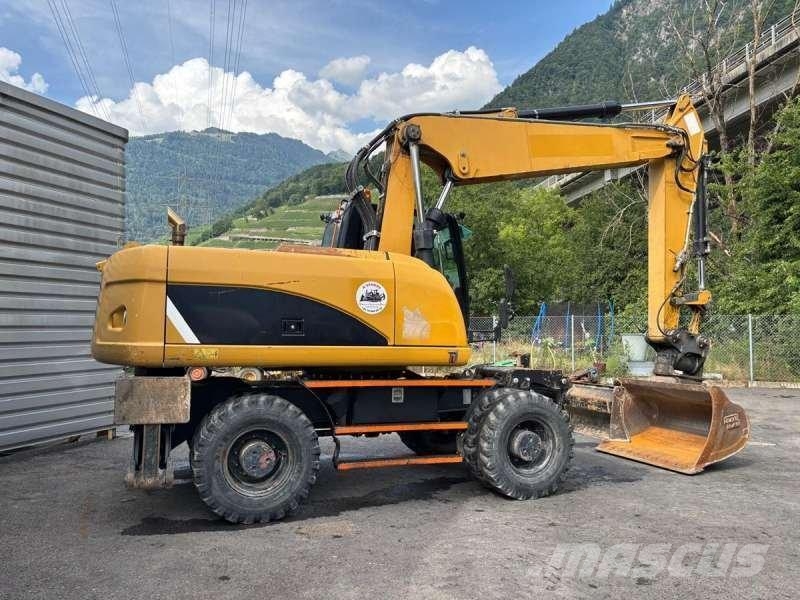 CAT M318D Bageri na kotačima