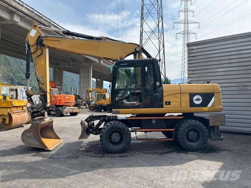 CAT M318D Bageri na kotačima