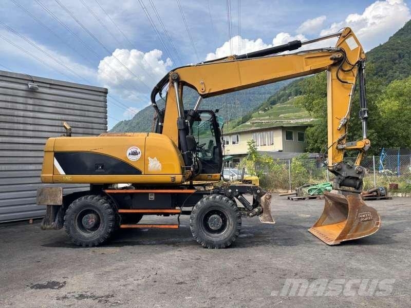 CAT M318D Bageri na kotačima