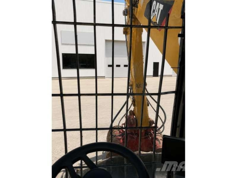 CAT MH3024 Jätteenkäsittelijät