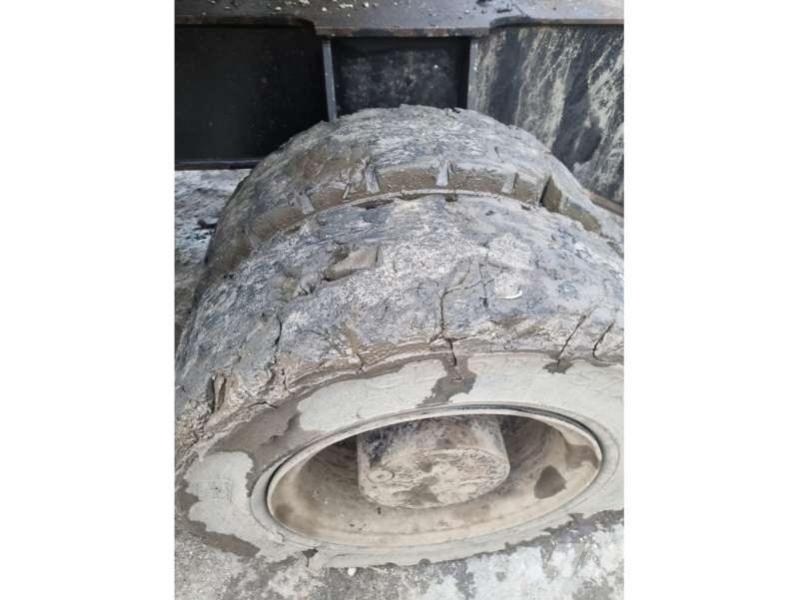 CAT MH3024 + grappin Materialumschlag