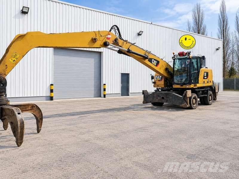 CAT MH3024 + grappin + GRAPPIN Bagri za prekladanje primarnih/sekundarnih surovin