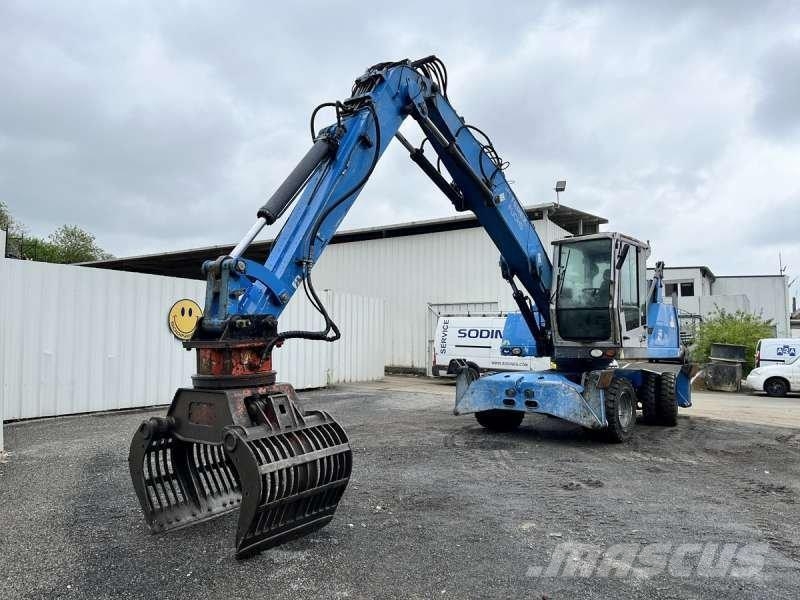 Fuchs MHL 320 مناولات المخلفات / مناولات صناعية