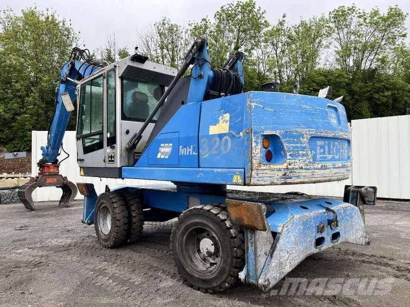 Fuchs MHL 320 مناولات المخلفات / مناولات صناعية