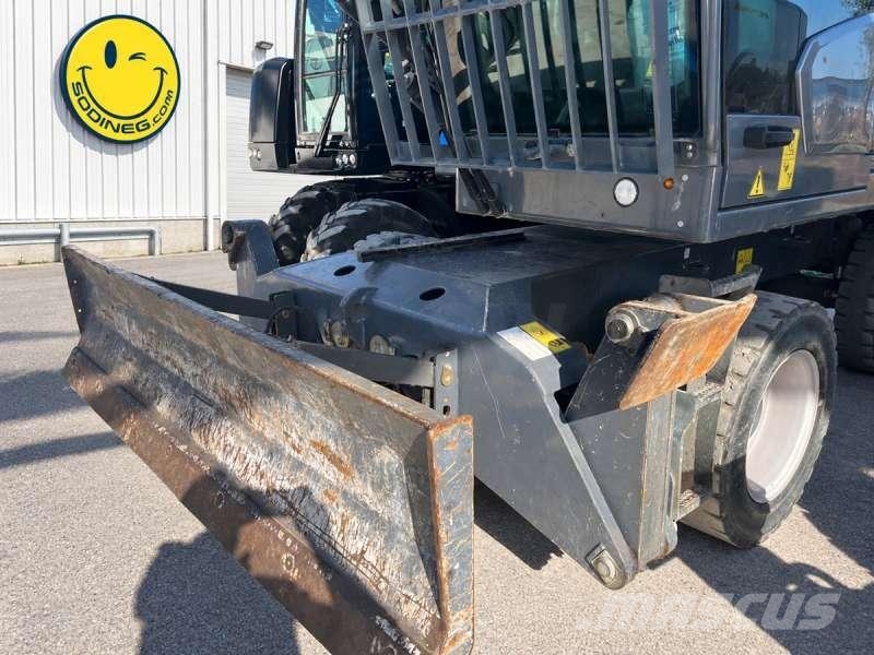 Fuchs MHL 320 Avfalls / industri hantering