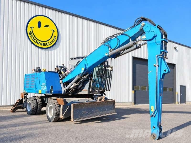 Fuchs MHL320F Stroje pre manipuláciu s odpadom