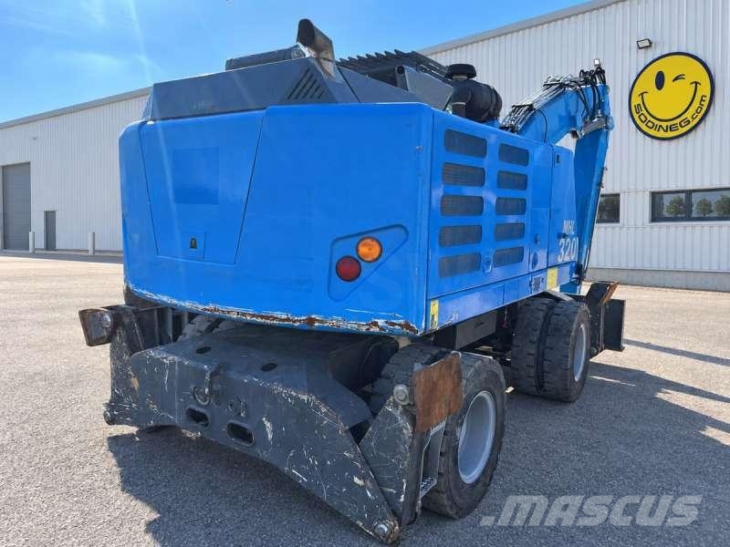 Fuchs MHL320F Stroje pre manipuláciu s odpadom