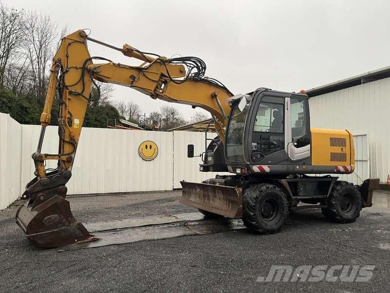 Hitachi ZX140W-3 حفارات بعجل
