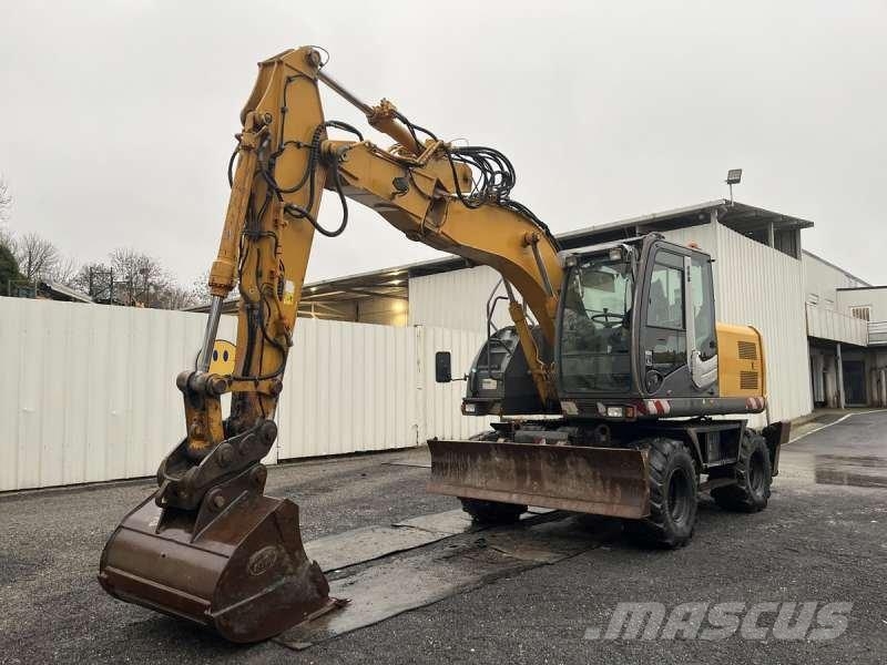 Hitachi ZX140W-3 حفارات بعجل