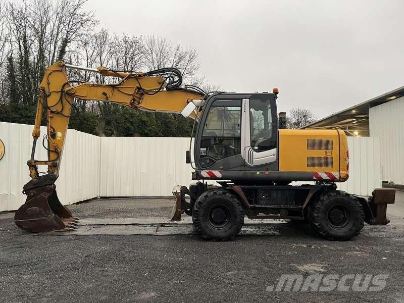 Hitachi ZX140W-3 حفارات بعجل