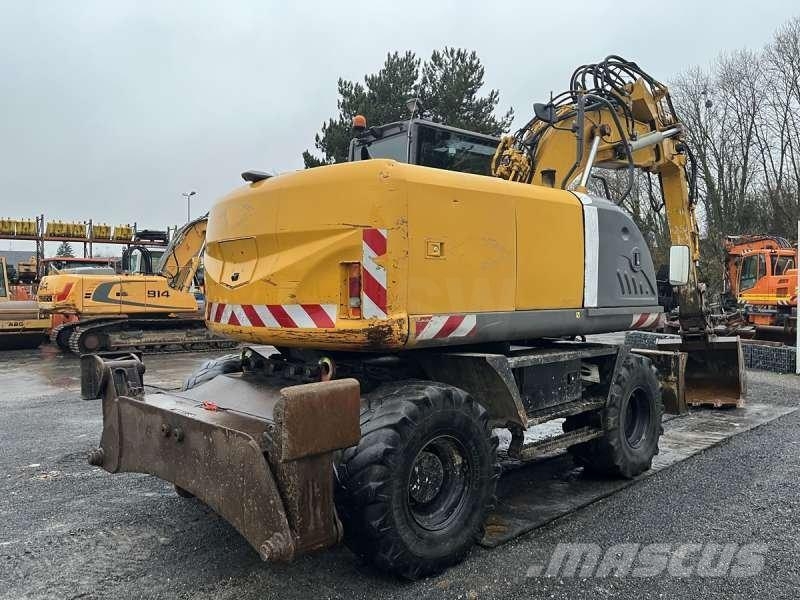 Hitachi ZX140W-3 حفارات بعجل