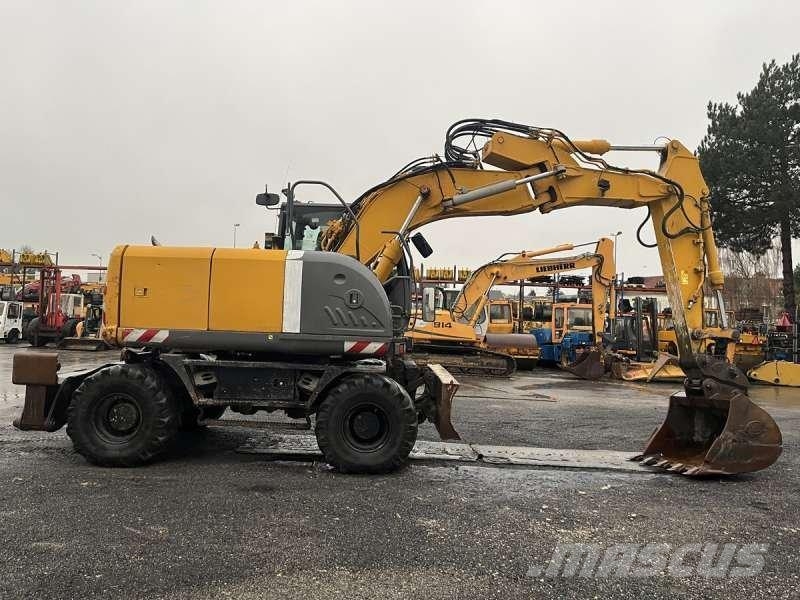 Hitachi ZX140W-3 حفارات بعجل
