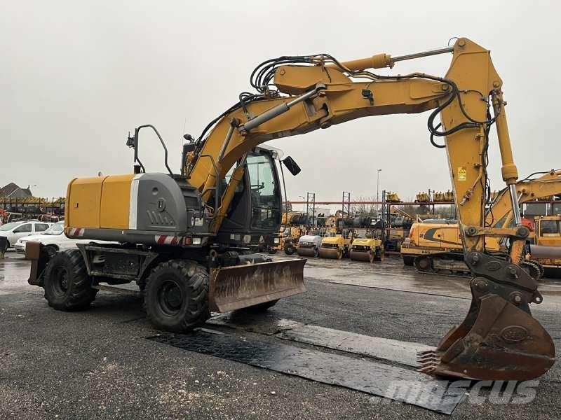 Hitachi ZX140W-3 حفارات بعجل
