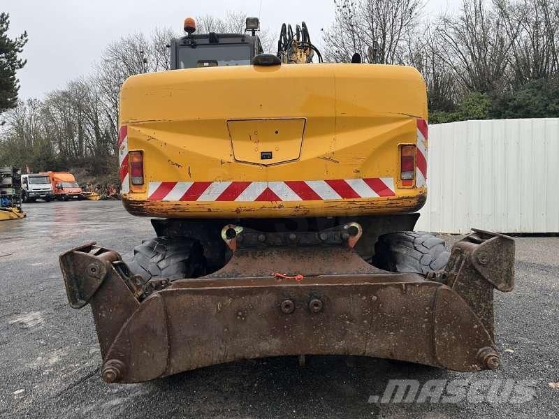 Hitachi ZX140W-3 حفارات بعجل