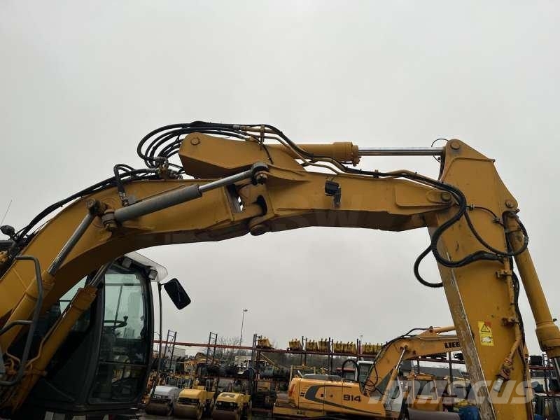 Hitachi ZX140W-3 حفارات بعجل