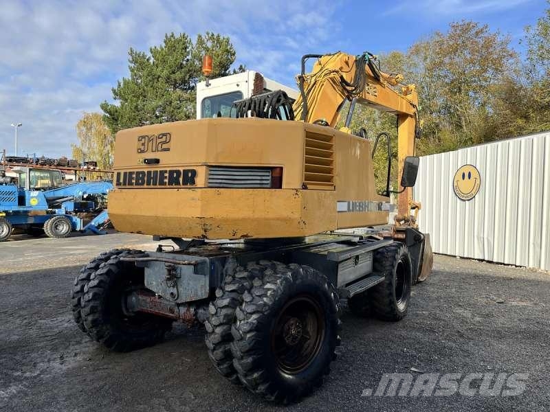 Liebherr A312 Колёсные экскаваторы