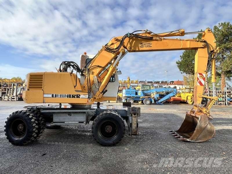Liebherr A312 Колёсные экскаваторы