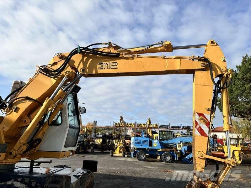 Liebherr A312 Колёсные экскаваторы