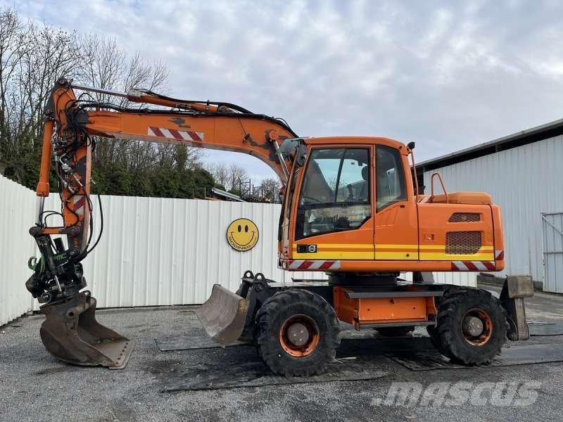 Volvo EW140D + ROTOTILT Ekskavatori uz riteņiem