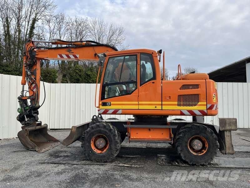 Volvo EW140D + ROTOTILT Ekskavatori uz riteņiem