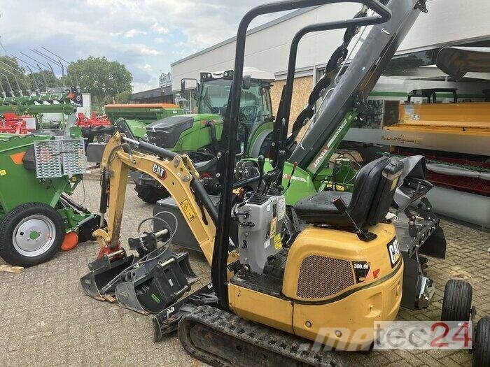 CAT 300.09D Ekskavatori uz riteņiem