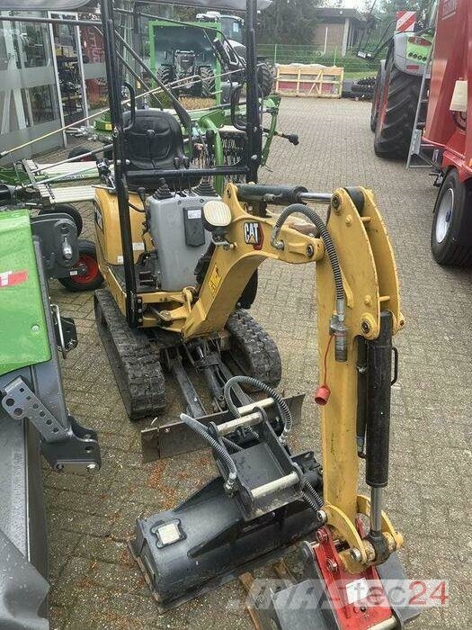 CAT 300.09D Ekskavatori uz riteņiem