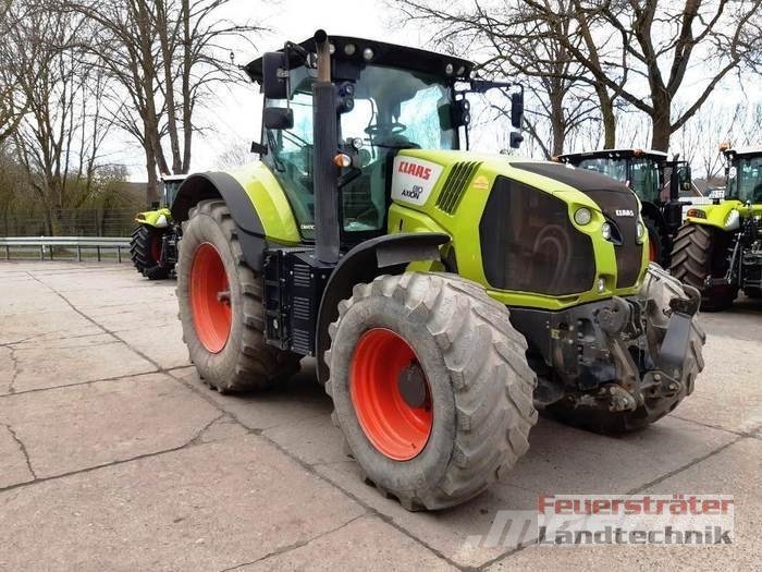 CLAAS AXION 810 CMATIC CEBIS Traktoriai