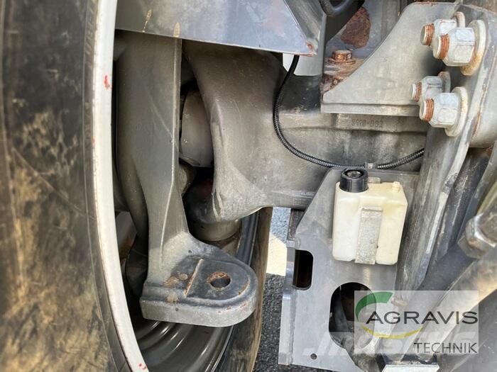 CLAAS XERION 4000 SADDLE TRAC + Zunhammer 11 CBM Aufsatz Трактори