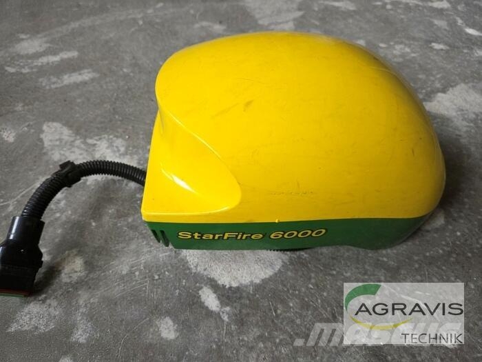 John Deere 6215 R Tractoren