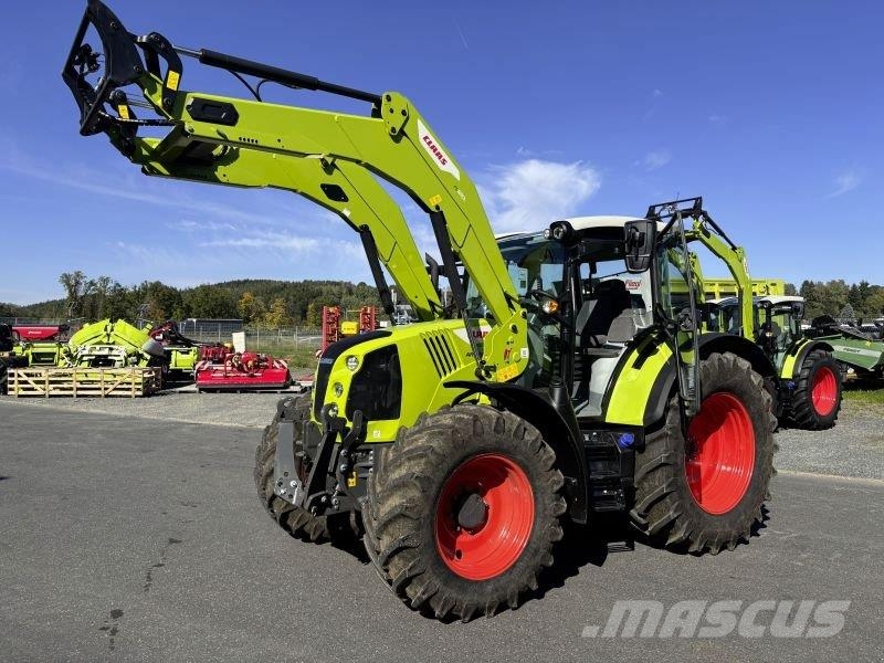CLAAS ARION 470 COMFORT + FL 120 C Tractoren