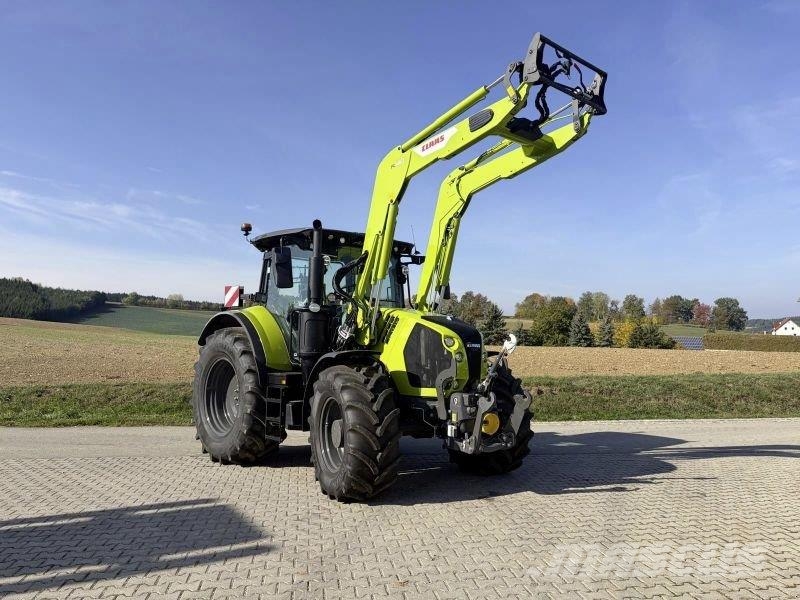 CLAAS ARION 570 CMATIC CEBIS + FL140 Tractoren