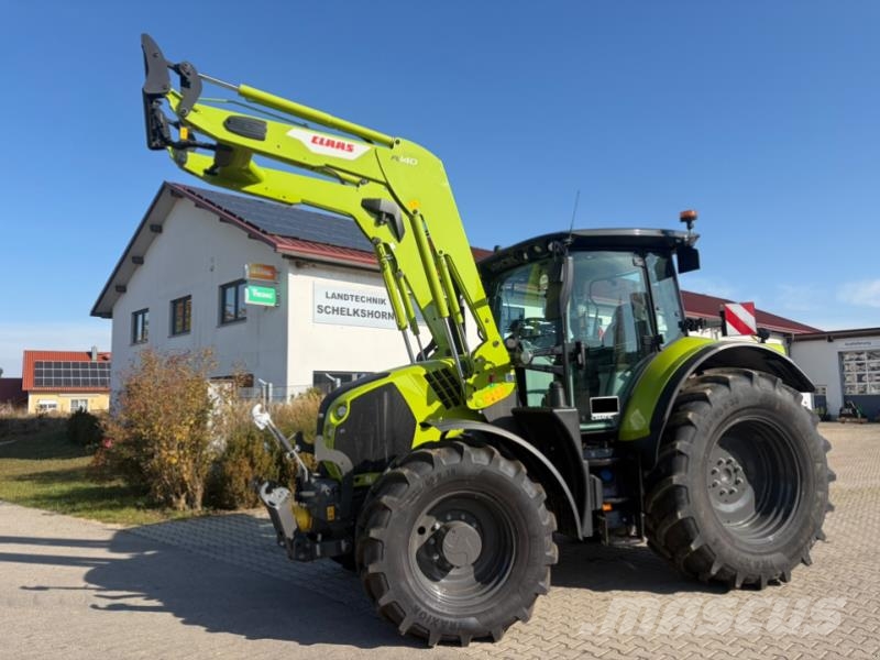 CLAAS ARION 570 CMATIC CEBIS + FL140 Tractoren