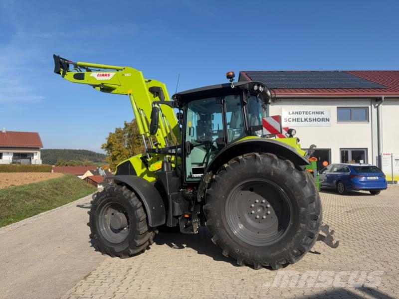 CLAAS ARION 570 CMATIC CEBIS + FL140 Tractoren