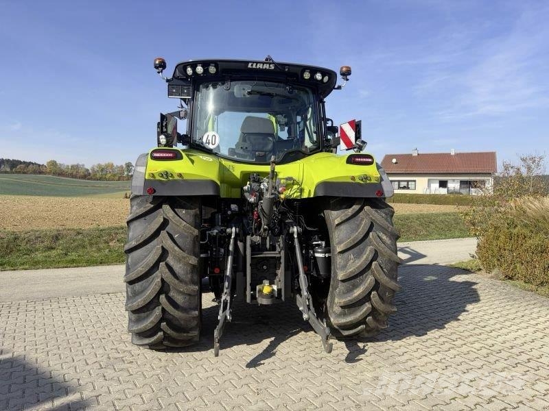 CLAAS ARION 570 CMATIC CEBIS + FL140 Tractoren