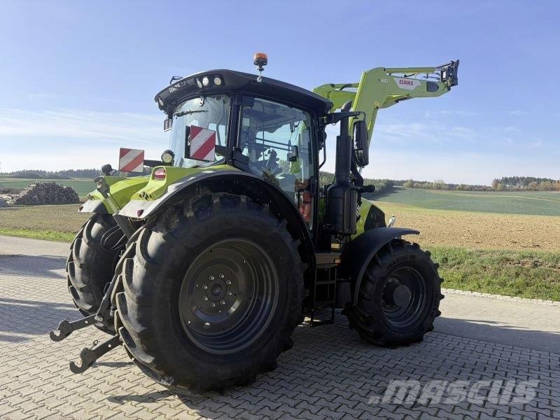 CLAAS ARION 570 CMATIC CEBIS + FL140 Tractoren