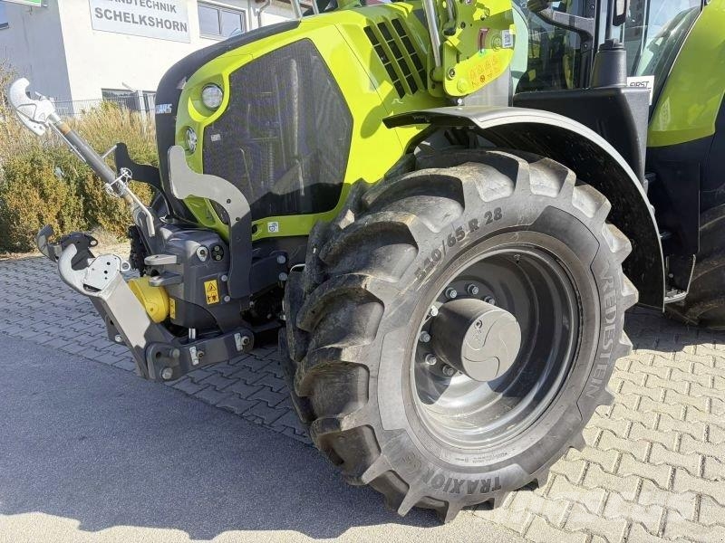 CLAAS ARION 570 CMATIC CEBIS + FL140 Tractoren