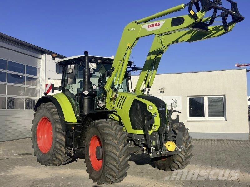 CLAAS ARION 570 +FL 140 Trattori