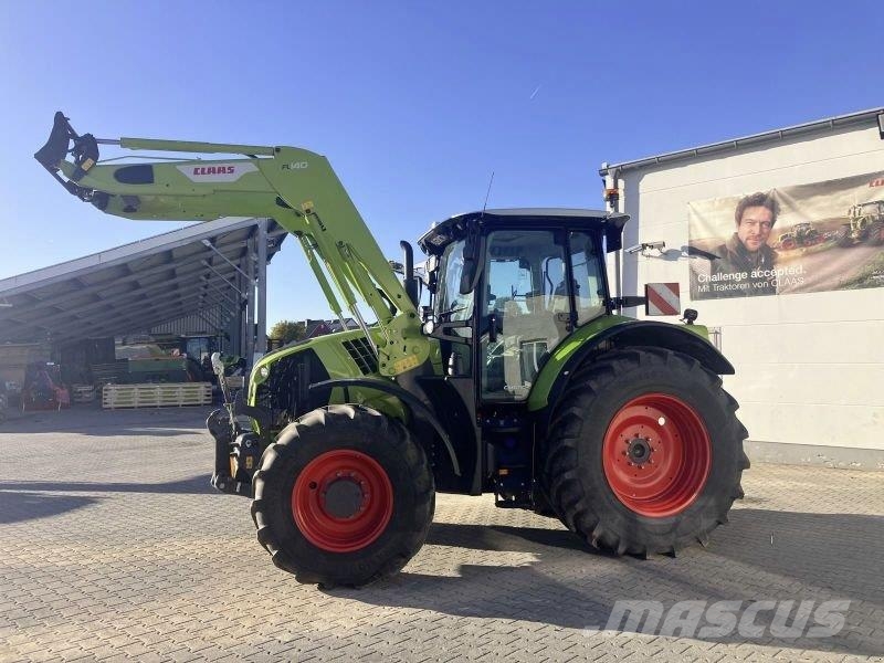 CLAAS ARION 570 +FL 140 Trattori