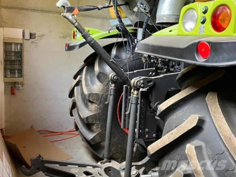 CLAAS Xerion 3300 Saddle Trac + Väderstad Carrier 525 XT Mesttank