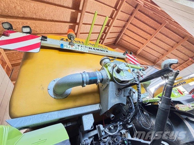 CLAAS Xerion 3300 Saddle Trac + Väderstad Carrier 525 XT Mesttank