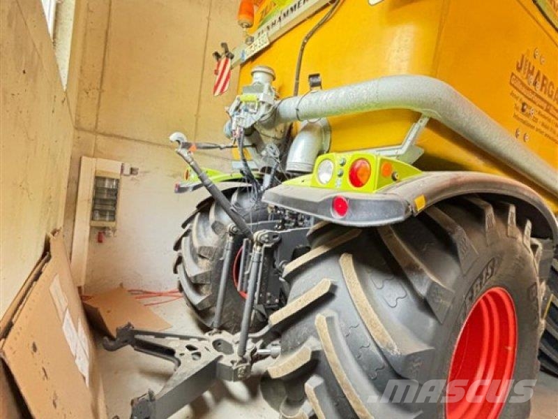 CLAAS Xerion 3300 Saddle Trac + Väderstad Carrier 525 XT Mesttank